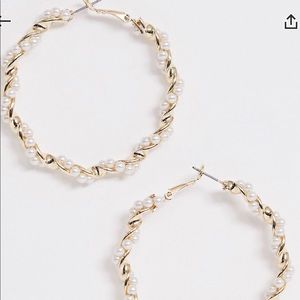 Golden hoop earrings with pearls